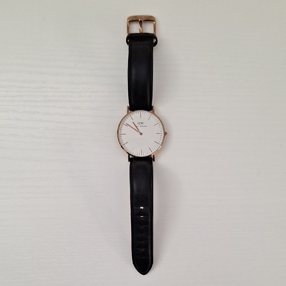Daniel Wellington Black and Gold Watch